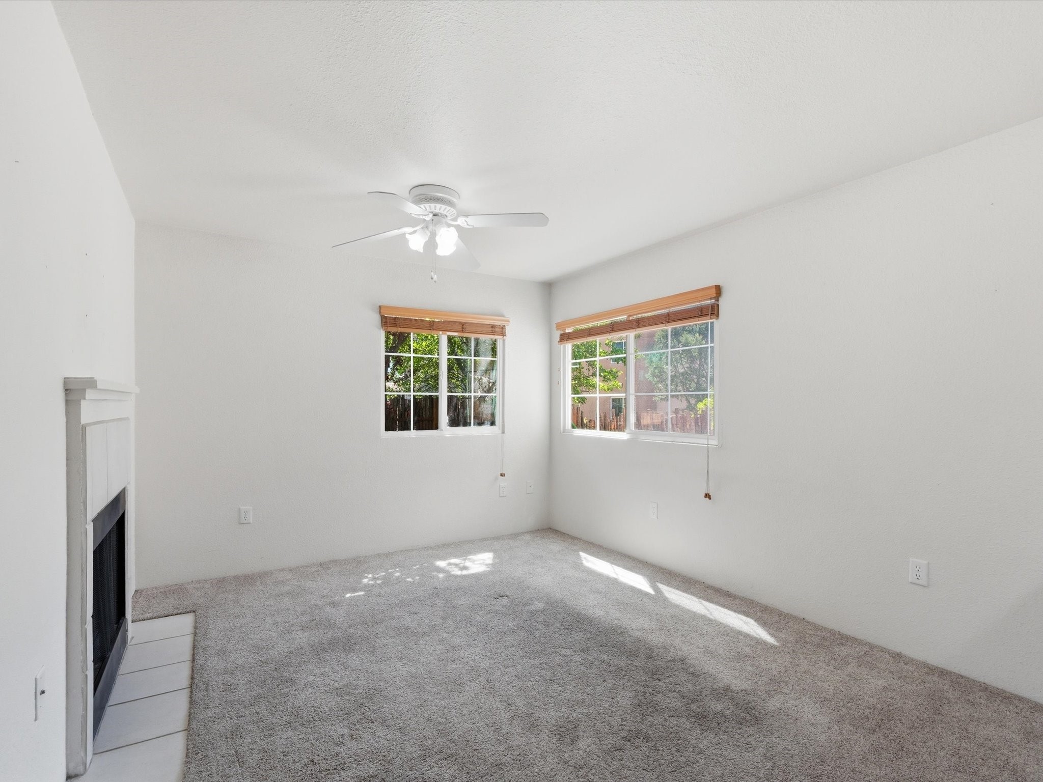 2210 Miguel Chavez Road, Unit 411 Santa Fe, NM 87505 - Photo 13 of 59 The living area with fireplace