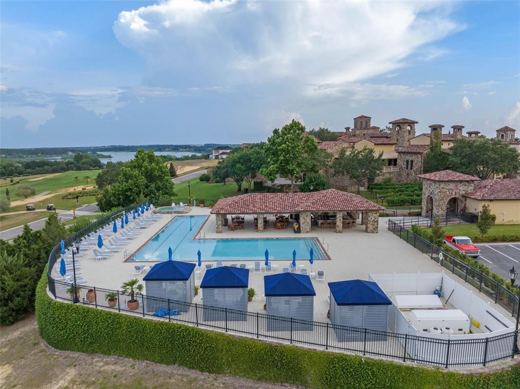 15746 Pendio Drive Montverde, FL 34756 - Photo 67 of 71 a view of yard with outdoor seating and city view