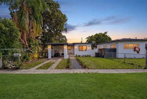 a view of a back yard of the house
