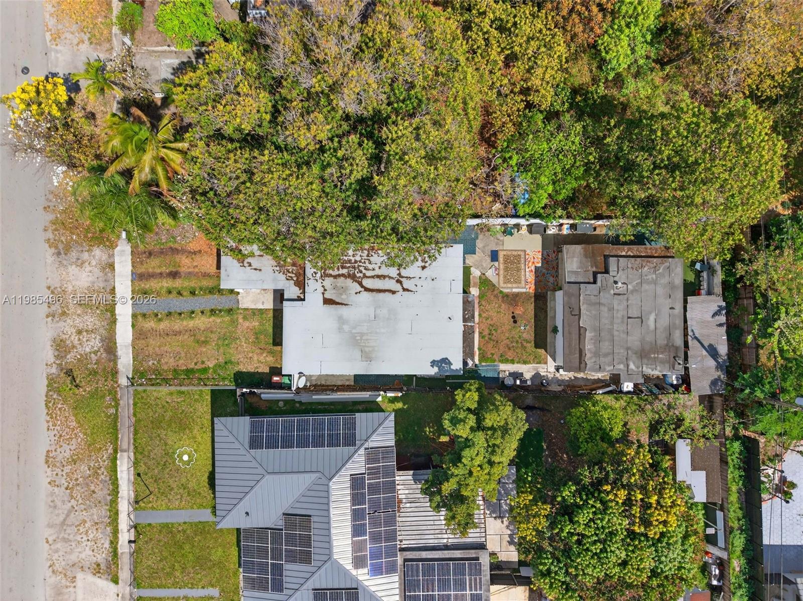 440 East 37th Street Hialeah, FL 33013 - Photo 19 of 27 an aerial view of residential houses with outdoor space