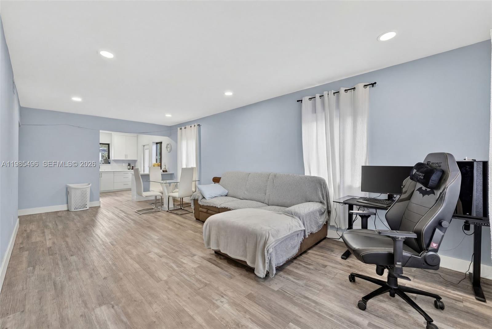 440 East 37th Street Hialeah, FL 33013 - Photo 5 of 27 a living room with furniture and a wooden floor