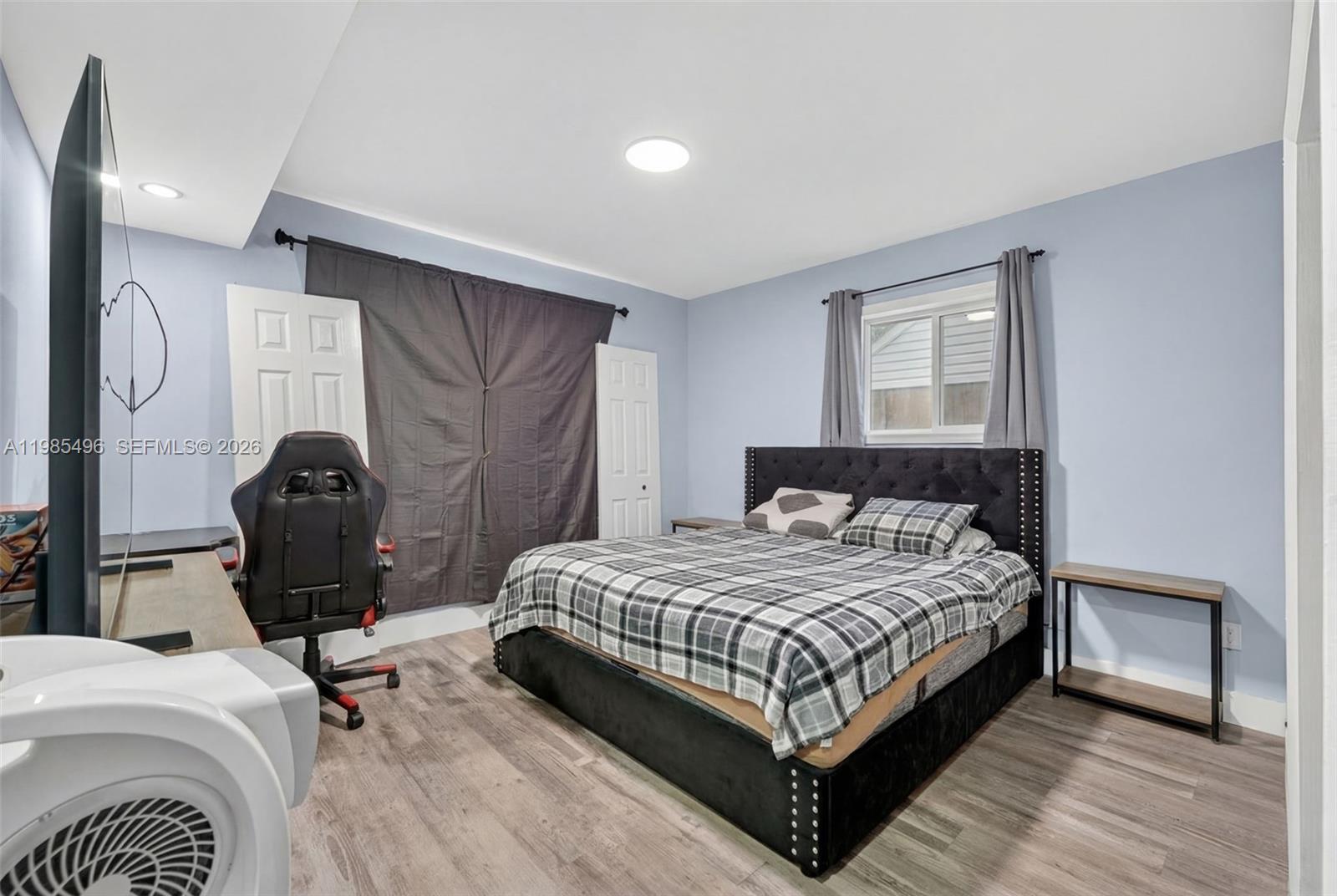 440 East 37th Street Hialeah, FL 33013 - Photo 10 of 27 a bedroom with a bed and a closet