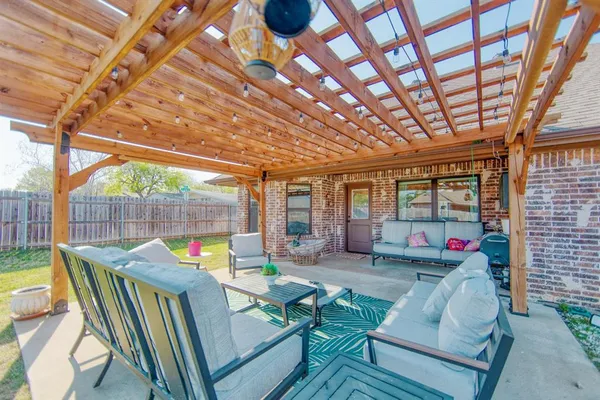 a outdoor living space with furniture and garden view