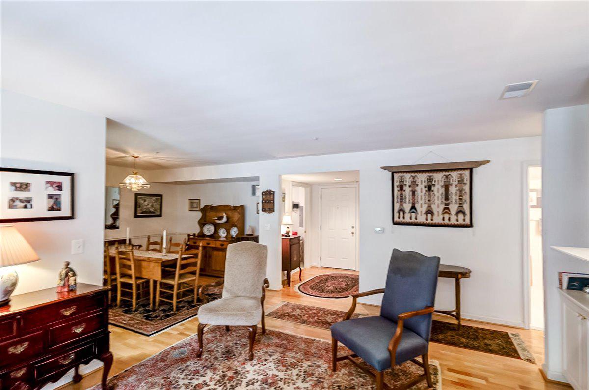 12320 Rosslare Ridge Road, Unit 201 Lutherville-Timonium, MD 21093 - Photo 18 of 41 View of formal dining room from living room