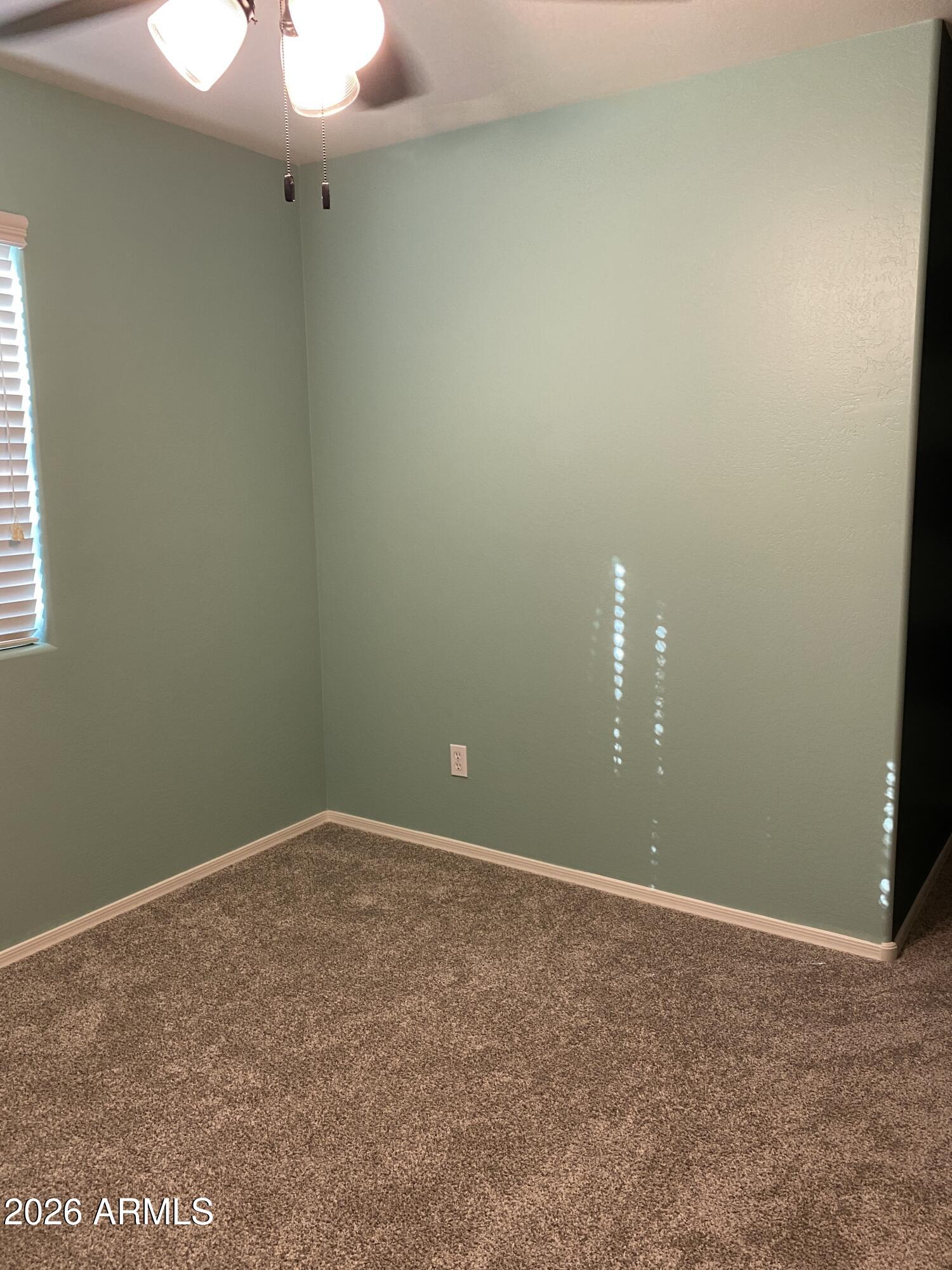 10225 West Camelback Road, Unit 19 Phoenix, AZ 85037 - Photo 24 of 51 a view of an empty room