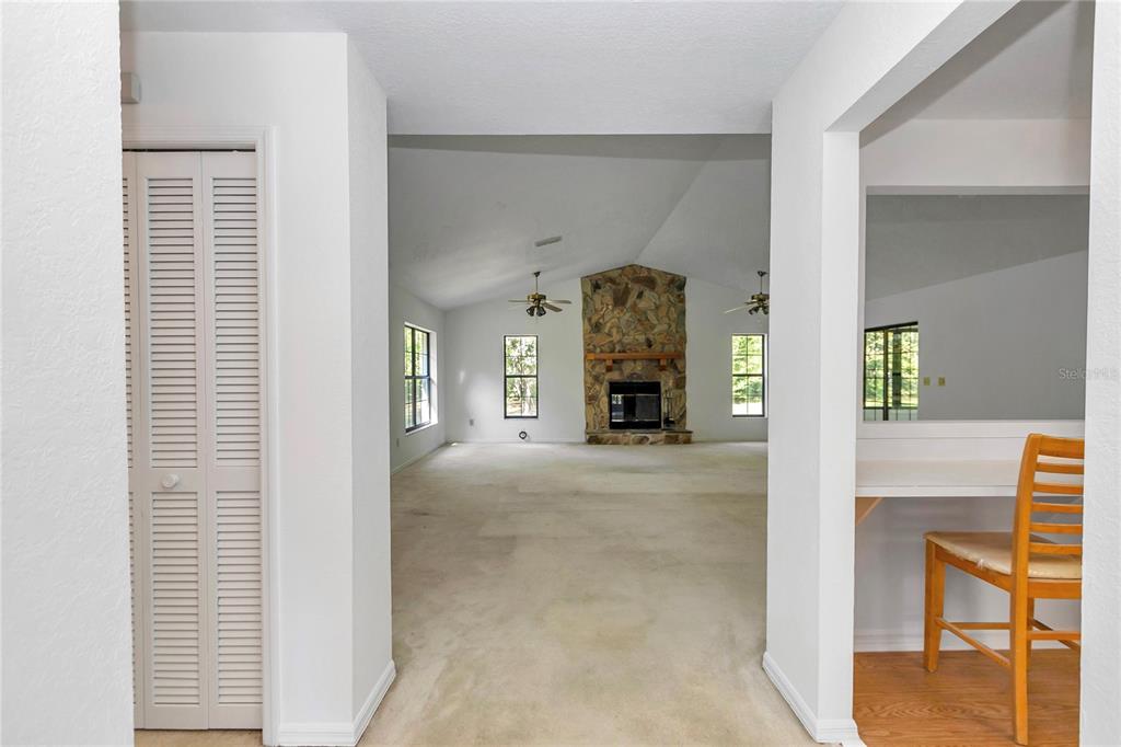 8160 Southwest 53rd Court Ocala, FL 34476 - Photo 17 of 54 a view of empty room with a fireplace