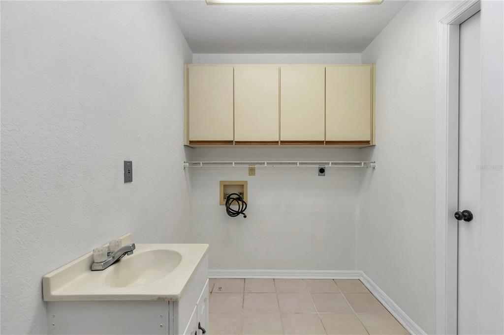 8160 Southwest 53rd Court Ocala, FL 34476 - Photo 31 of 54 a bathroom with a sink