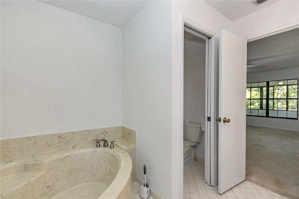8160 Southwest 53rd Court Ocala, FL 34476 - Photo 38 of 54 wooden floor in a bathroom