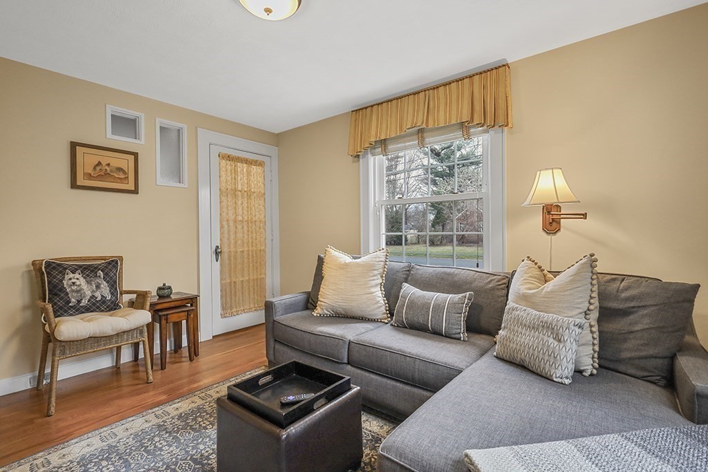 8 Leland Road Natick, MA 01760 - Photo 16 of 21 a living room with furniture and a window