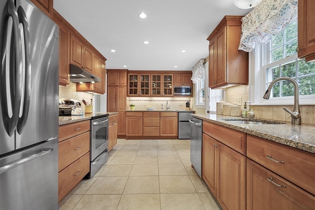 8 Leland Road Natick, MA 01760 - Photo 2 of 21 a large kitchen with stainless steel appliances granite countertop a refrigerator and a sink