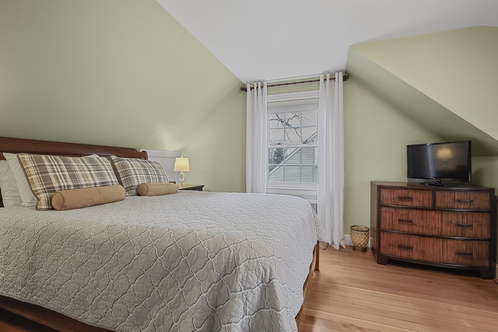 8 Leland Road Natick, MA 01760 - Photo 10 of 21 a bedroom with a bed and a television