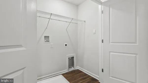 a bathroom with a shower and a door