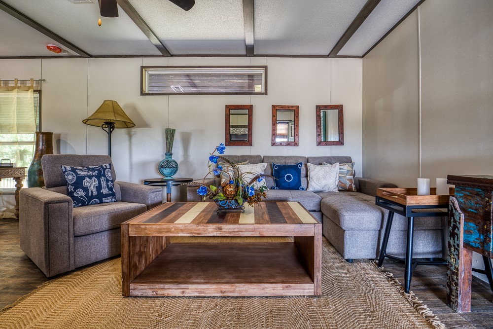 35418 Tompkins Road Hempstead, TX 77445 - Photo 11 of 50 a living room with furniture and a chandelier