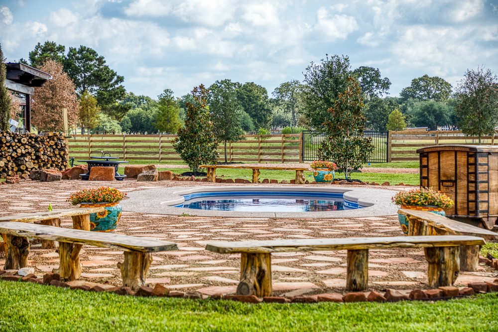 35418 Tompkins Road Hempstead, TX 77445 - Photo 30 of 50 a view of a house with a yard