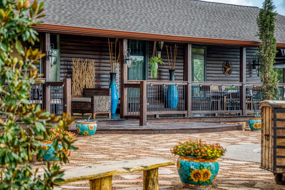 35418 Tompkins Road Hempstead, TX 77445 - Photo 4 of 50 a front view of a house with sitting area