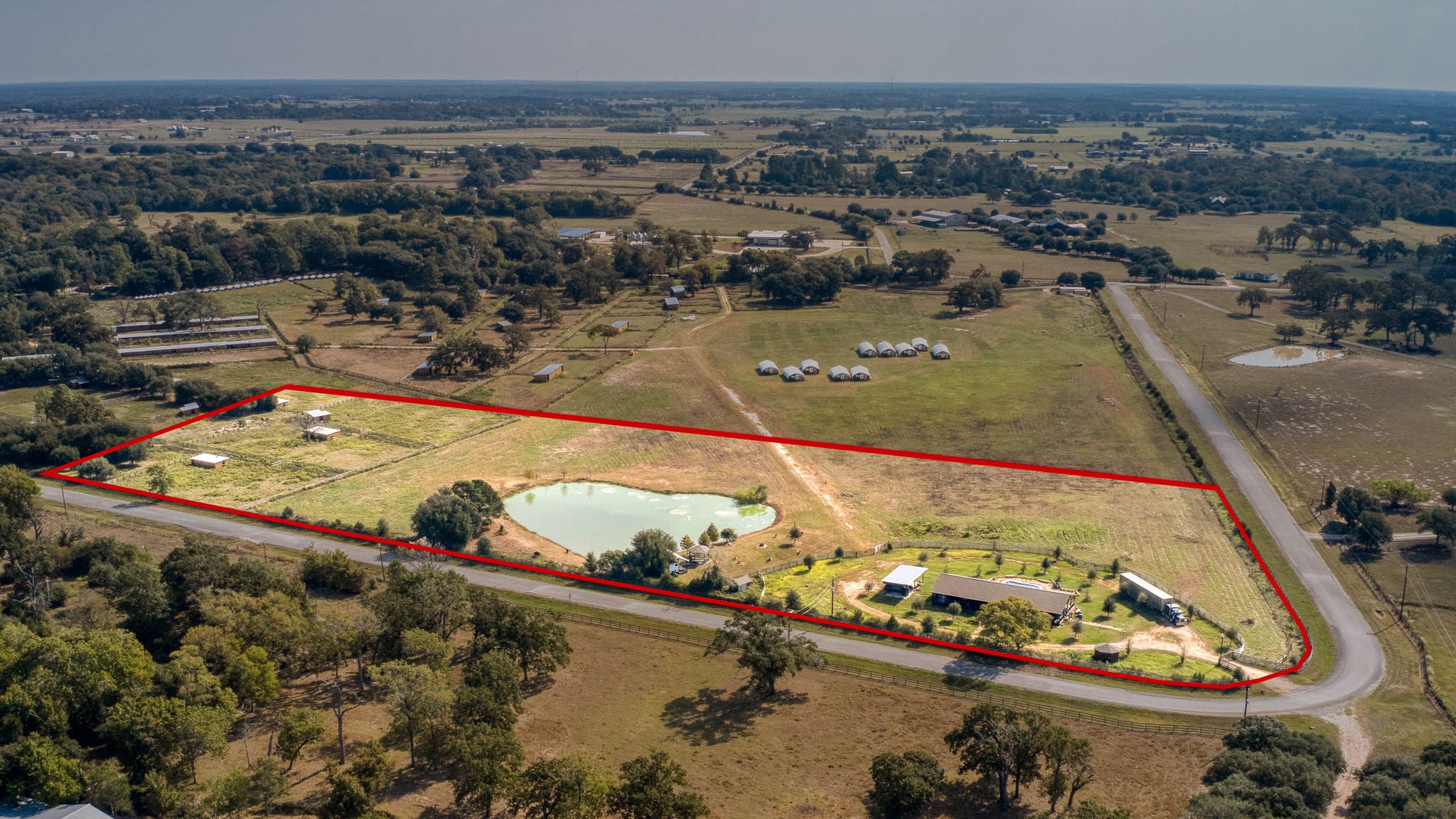 35418 Tompkins Road Hempstead, TX 77445 - Photo 49 of 50 an aerial view of a residential houses with outdoor space