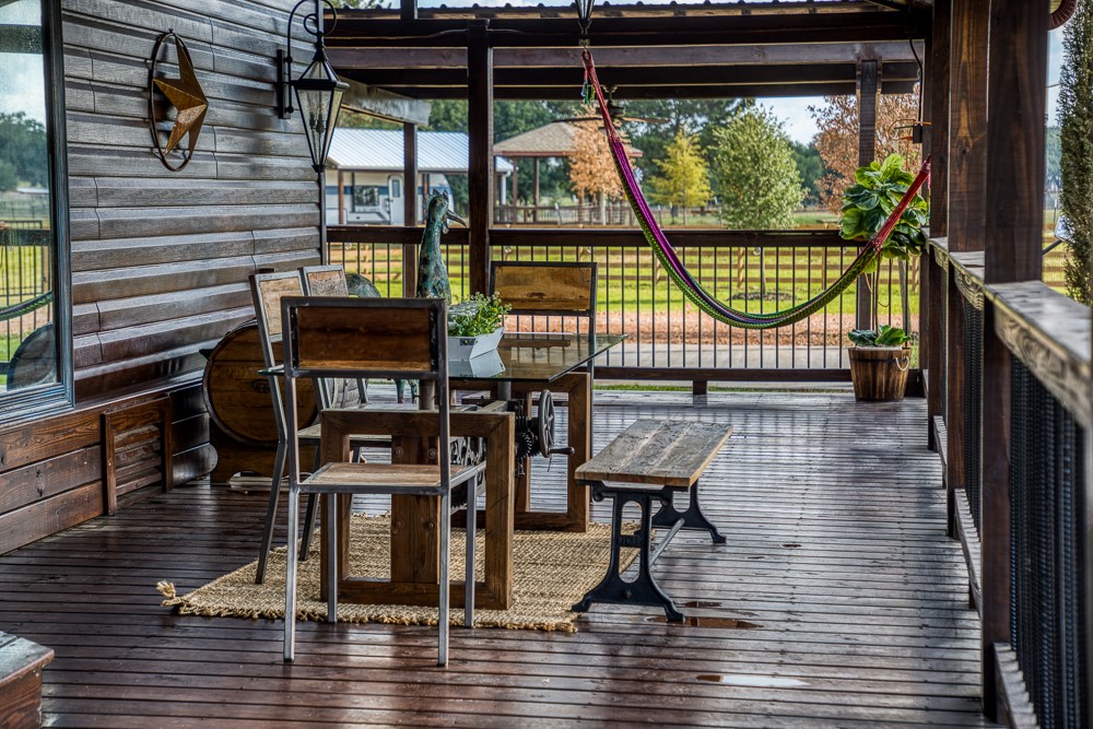 35418 Tompkins Road Hempstead, TX 77445 - Photo 7 of 50 a view of a balcony with chairs