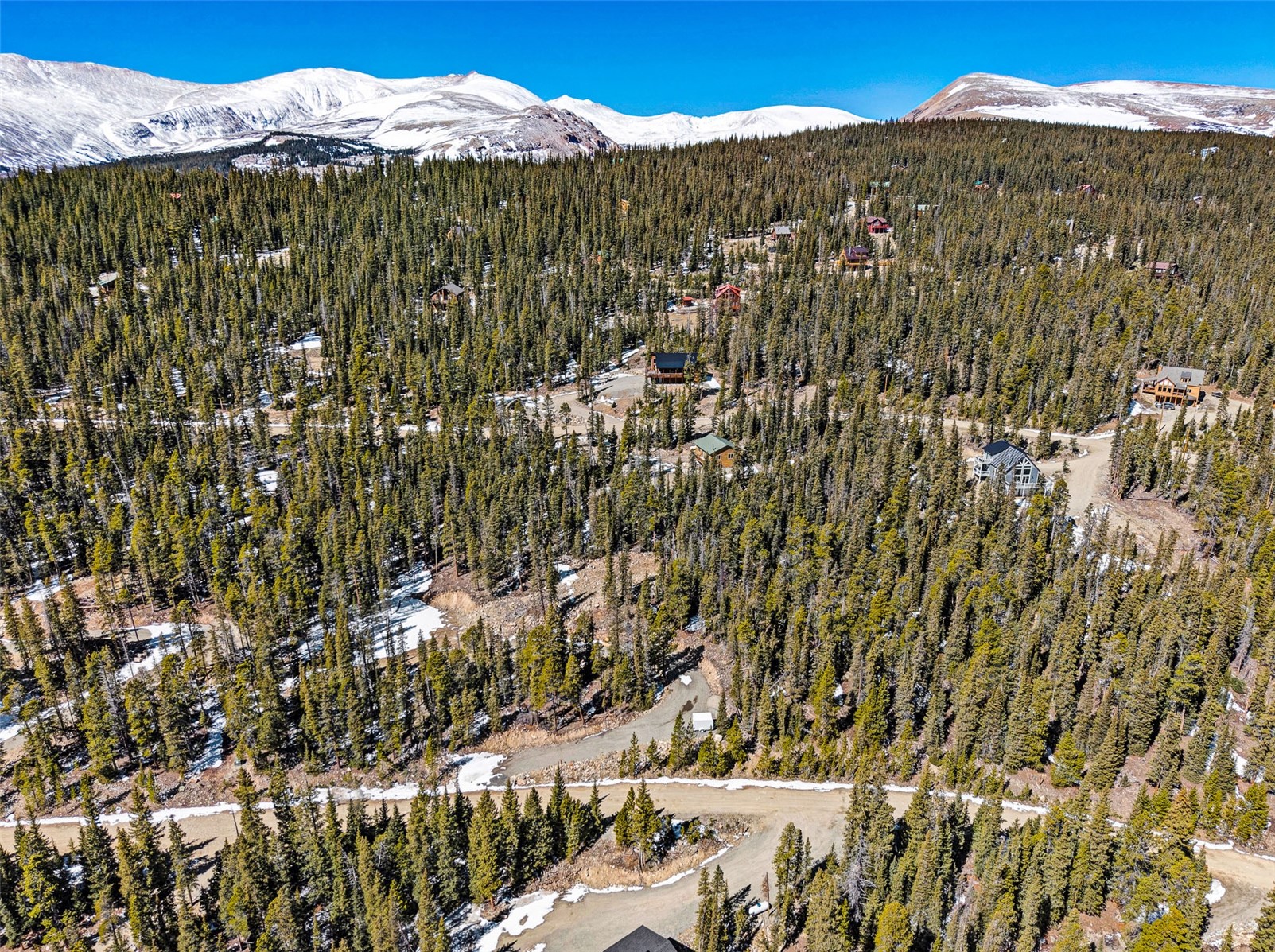 313 Porcupine Road Fairplay, CO 80440 - Photo 18 of 50 a view of a dry yard with mountains in the background