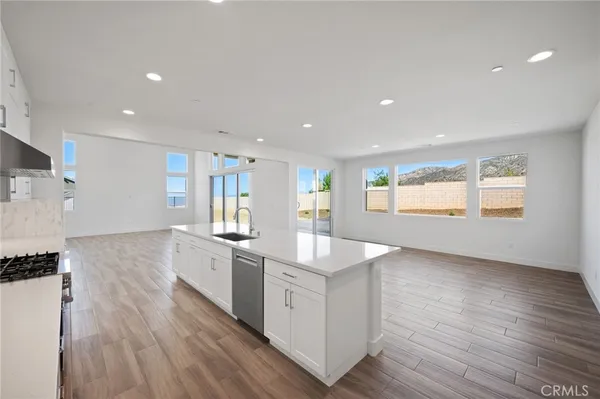a view of a hallway with white walls