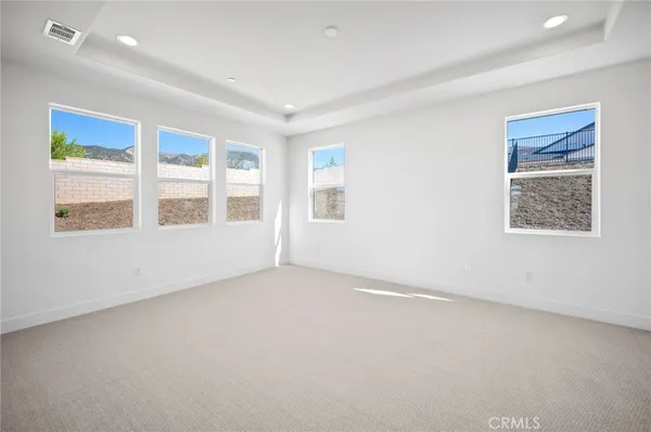 an empty room with windows