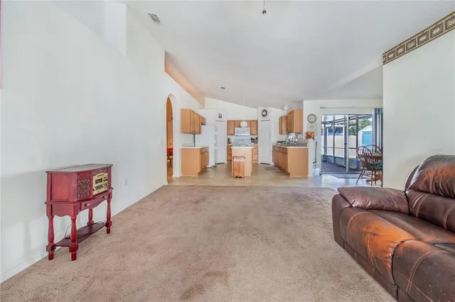 a large kitchen with stainless steel appliances lots of counter top space
