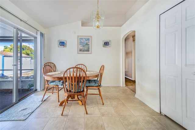 a room with lots of table and chair