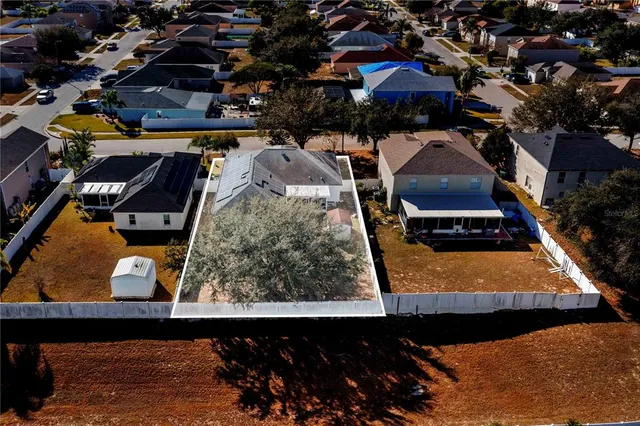 a view of a sign board with a yard