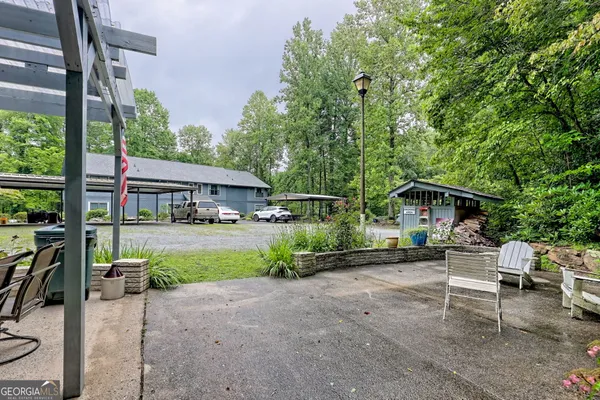 a view of house with outdoor entertaining spaces