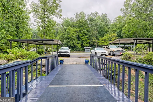 a view of a house with backyard and porch