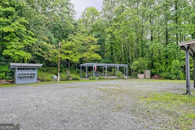 a house view with a sitting space and garden view