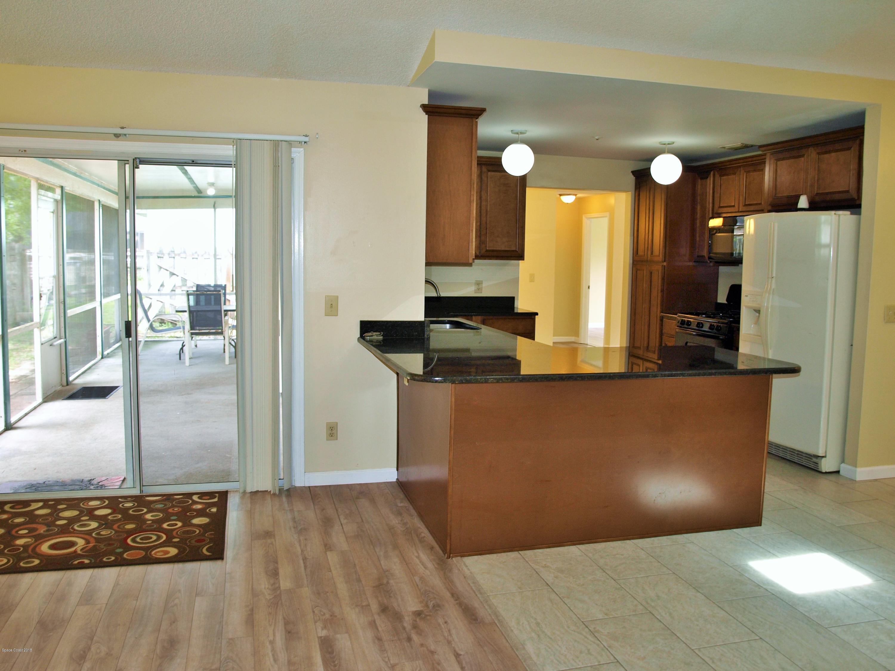 164 Oak Lake Road Melbourne, FL 32901 - Photo 15 of 35 Sliding Door to Patio Area