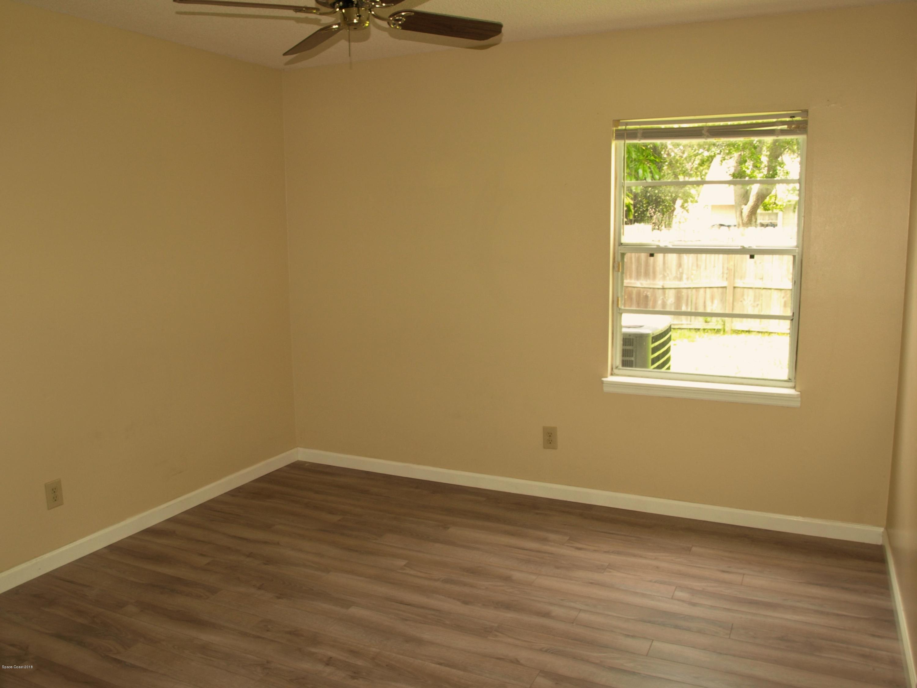 164 Oak Lake Road Melbourne, FL 32901 - Photo 18 of 35 Guest Back Bedroom