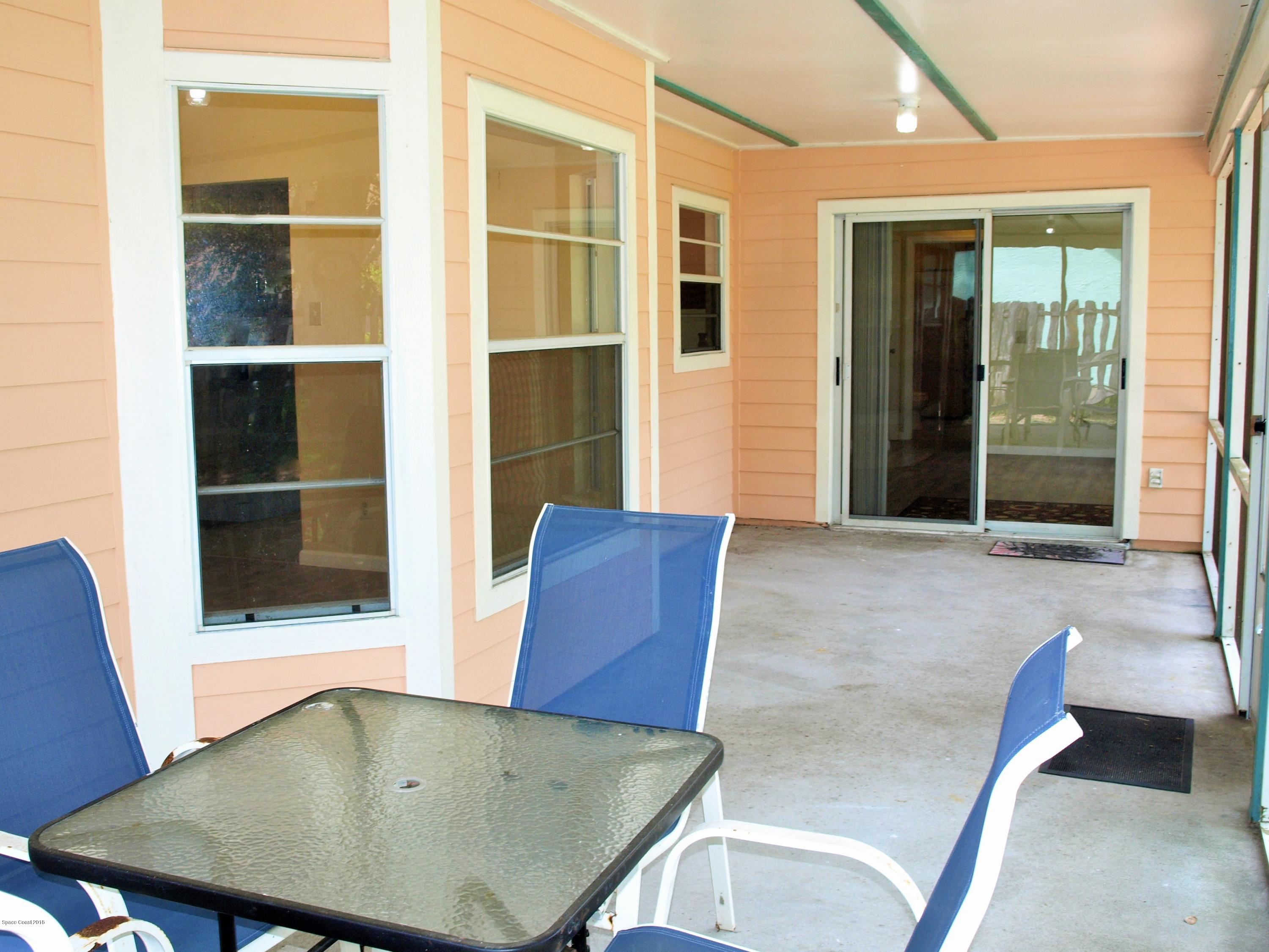 164 Oak Lake Road Melbourne, FL 32901 - Photo 33 of 35 Back Screened Patio Area