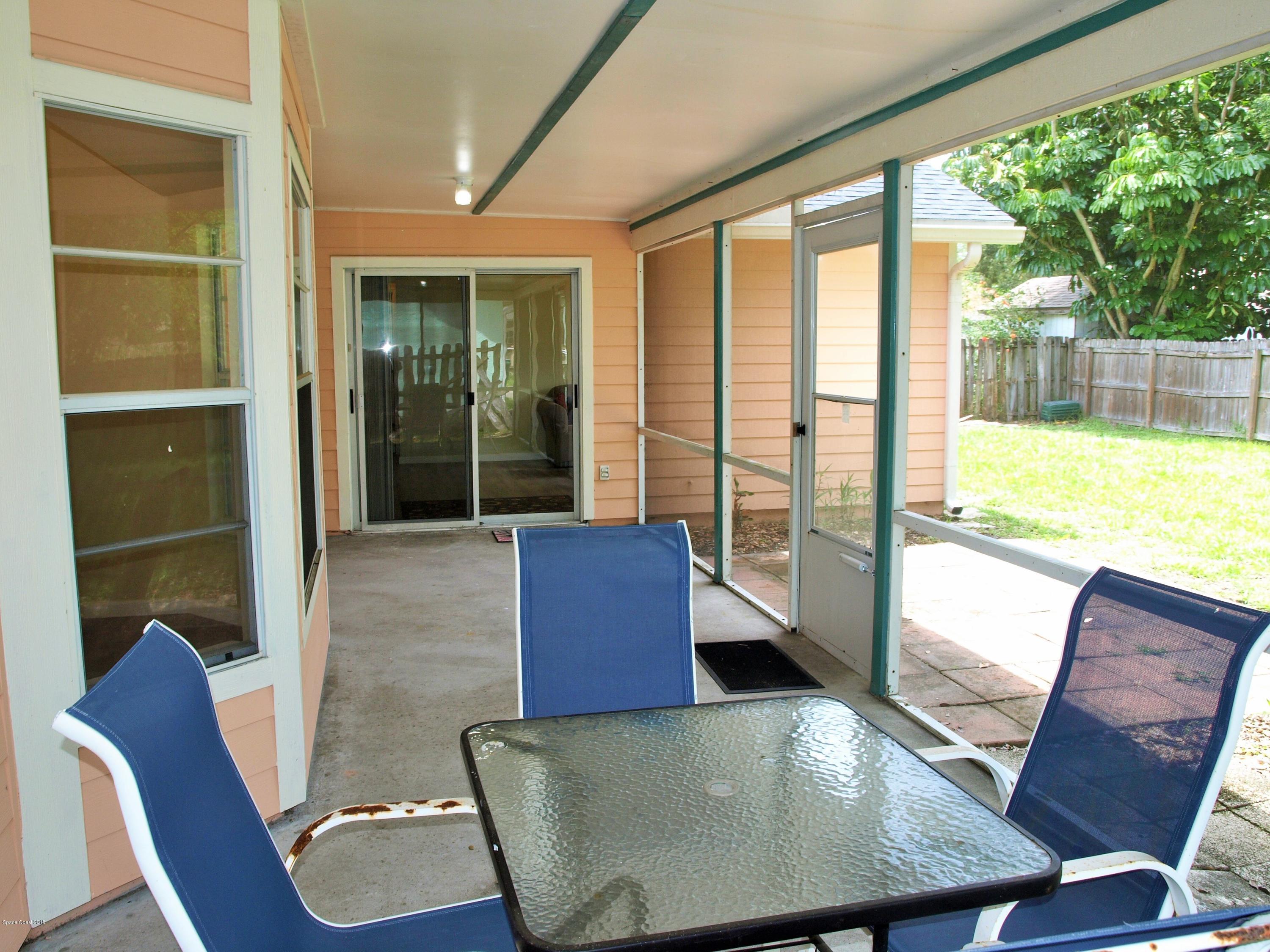 164 Oak Lake Road Melbourne, FL 32901 - Photo 34 of 35 Back Screened Patio Area