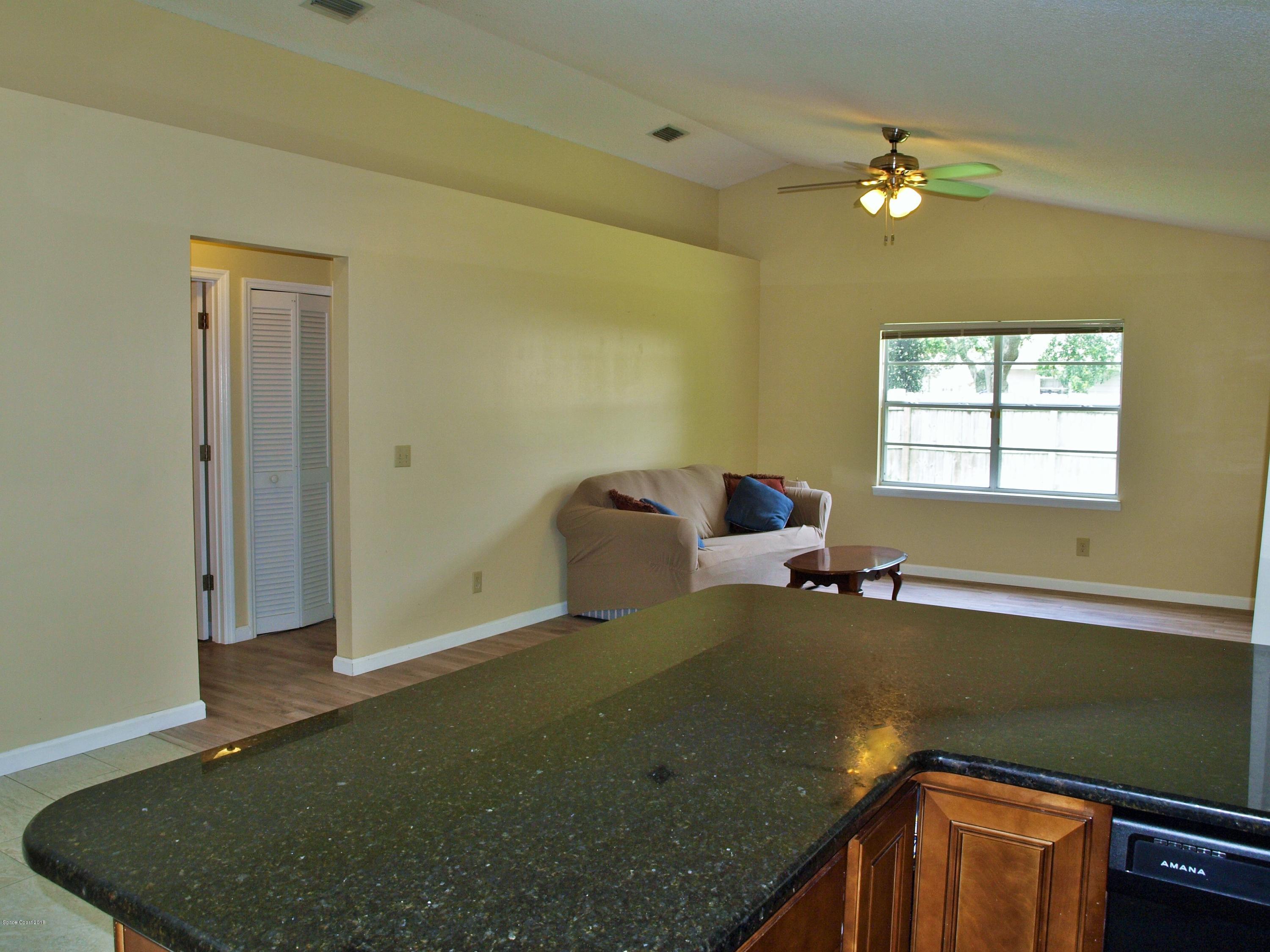 164 Oak Lake Road Melbourne, FL 32901 - Photo 10 of 35 Family Room From Kitchen