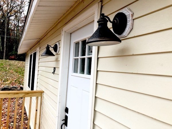 31 Richie Road Douglas, MA 01516 - Photo 3 of 16 a front view of a house with a window