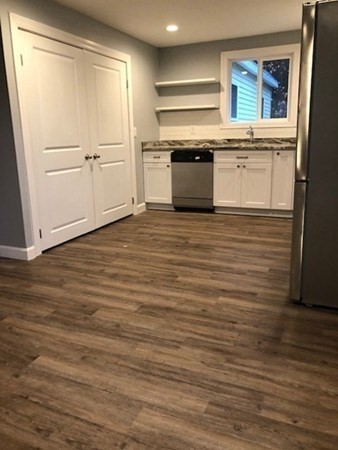 31 Richie Road Douglas, MA 01516 - Photo 5 of 16 a kitchen with stainless steel appliances granite countertop a refrigerator and a stove