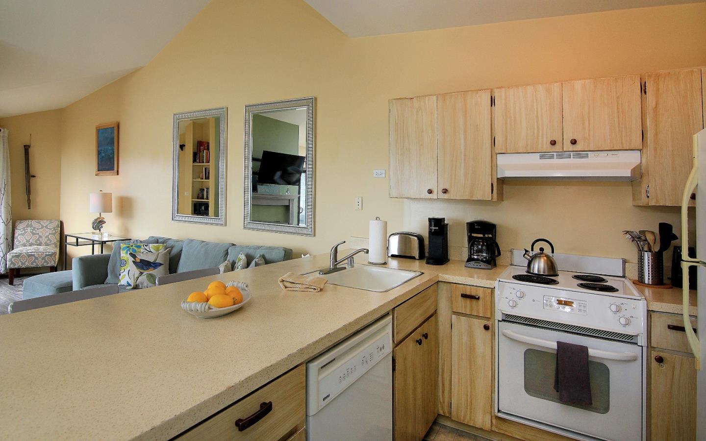 66 Pelican Point Watsonville, CA 95076 - Photo 18 of 30 a view of a kitchen with a sink and cabinets