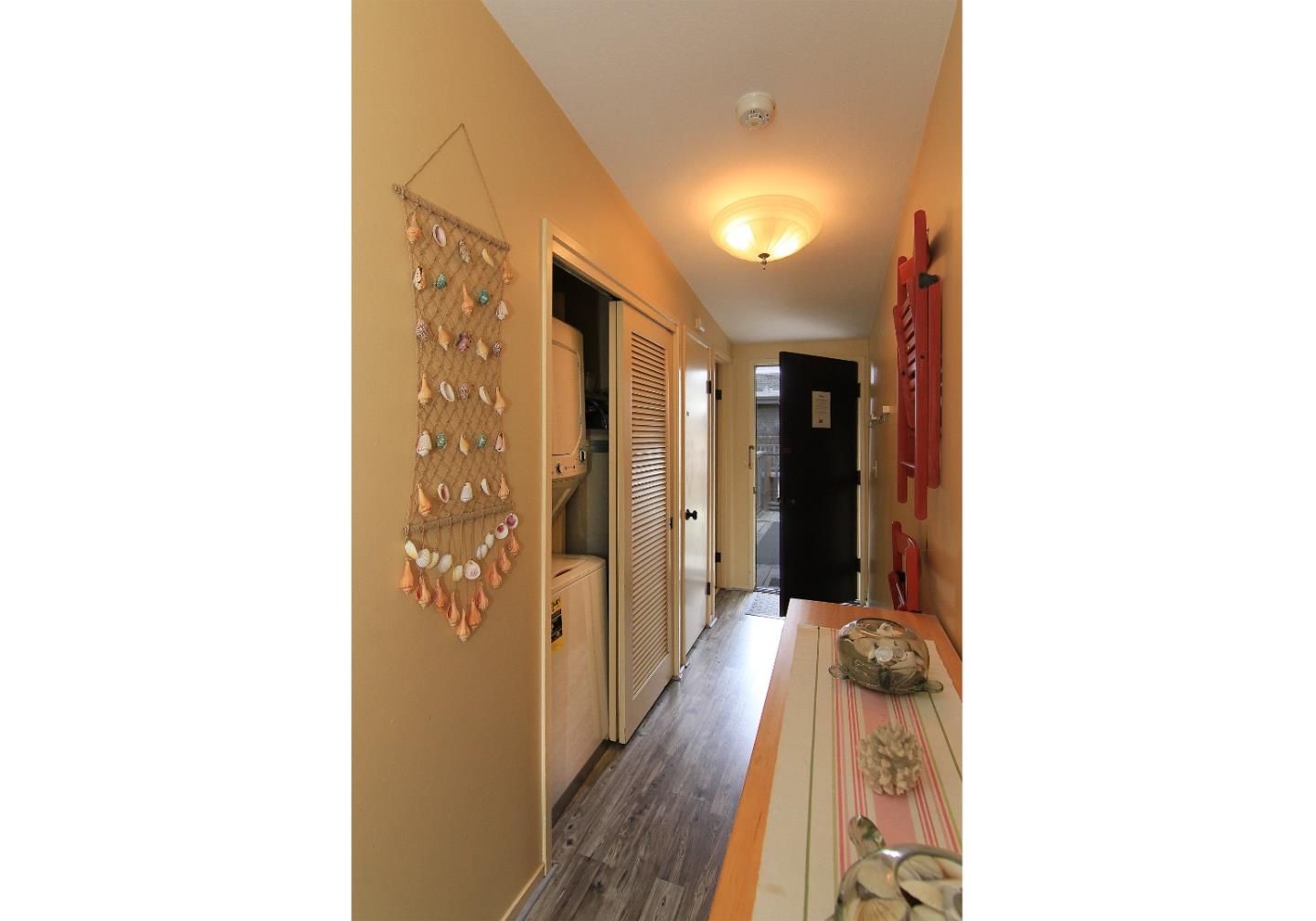 66 Pelican Point Watsonville, CA 95076 - Photo 20 of 30 a view of a hallway with wooden floor