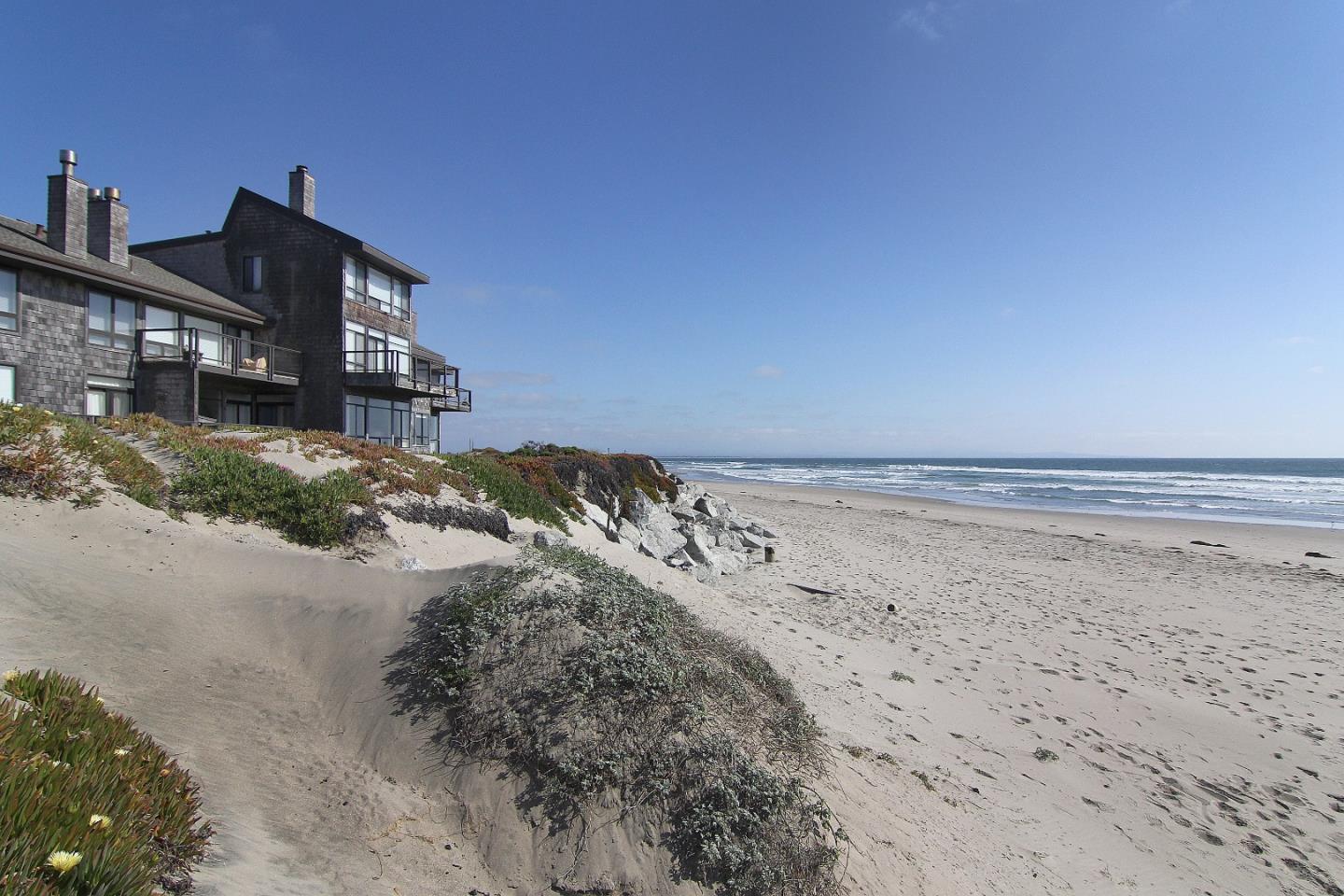 66 Pelican Point Watsonville, CA 95076 - Photo 26 of 30 a view of roof with wooden floor and a building in the background