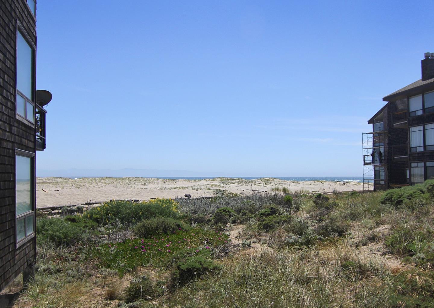 66 Pelican Point Watsonville, CA 95076 - Photo 7 of 30 a view of a field with an ocean