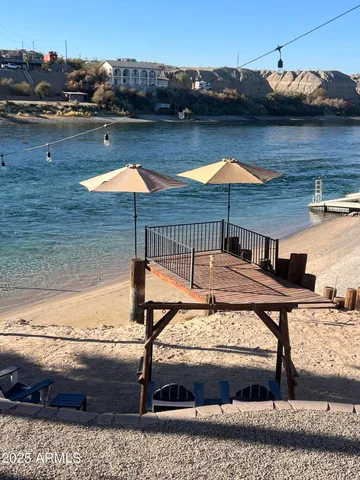 a view of swimming pool with an outdoor seating