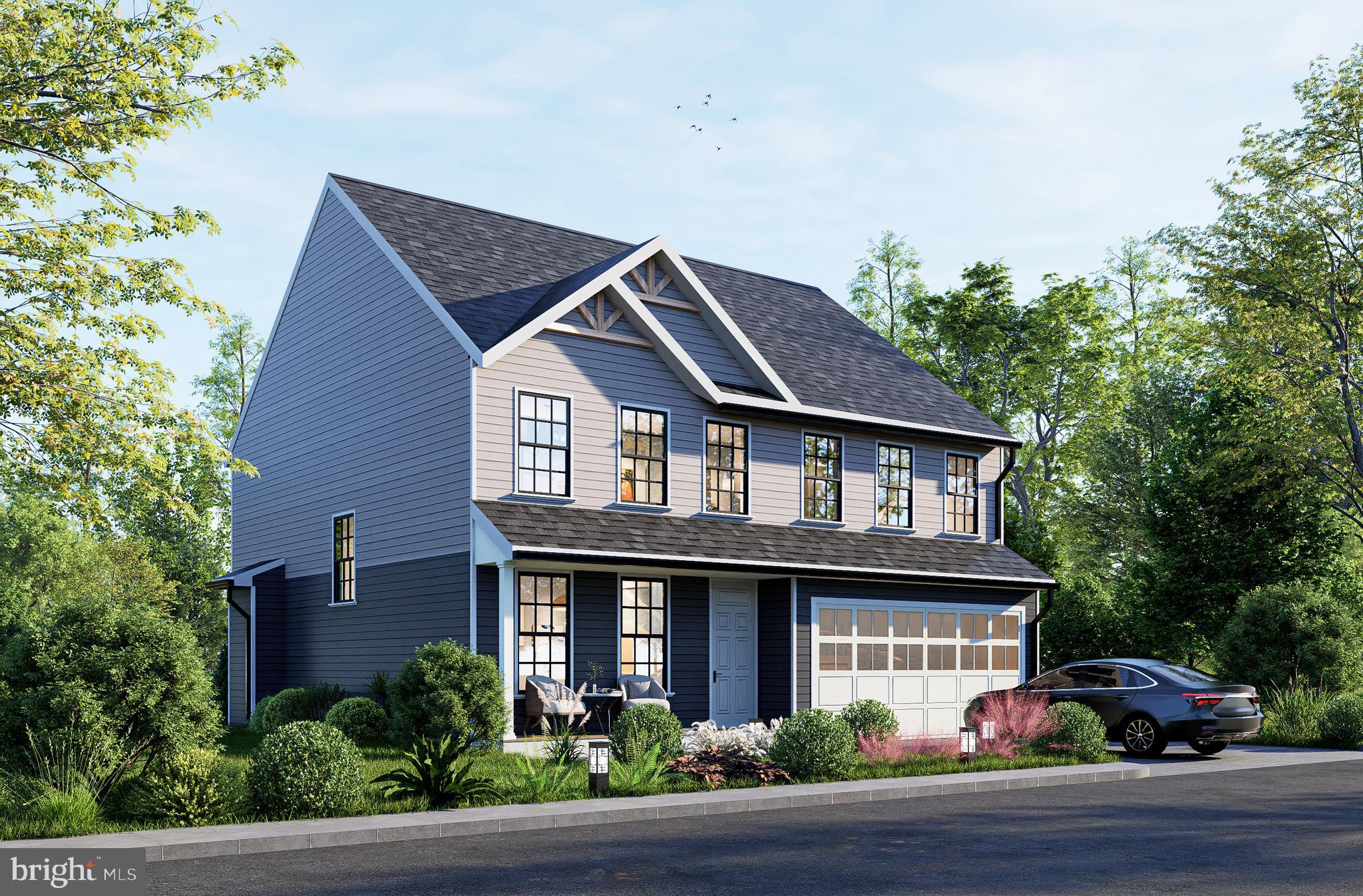 1638 Indiana Avenue Woodbridge, VA 22191 - Photo 2 of 6 a front view of a house with a yard