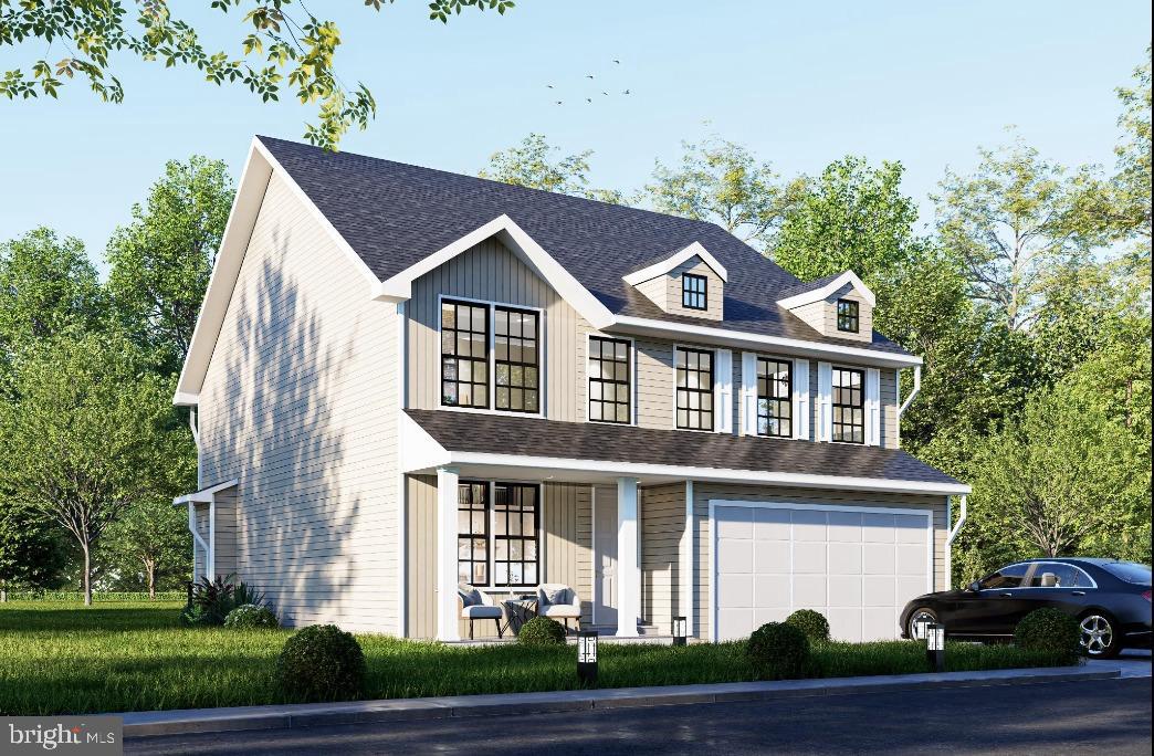 1638 Indiana Avenue Woodbridge, VA 22191 - Photo 2 of 11 a front view of a house with a yard