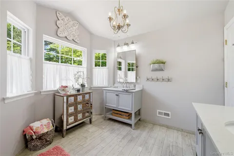 a kitchen with sink and window