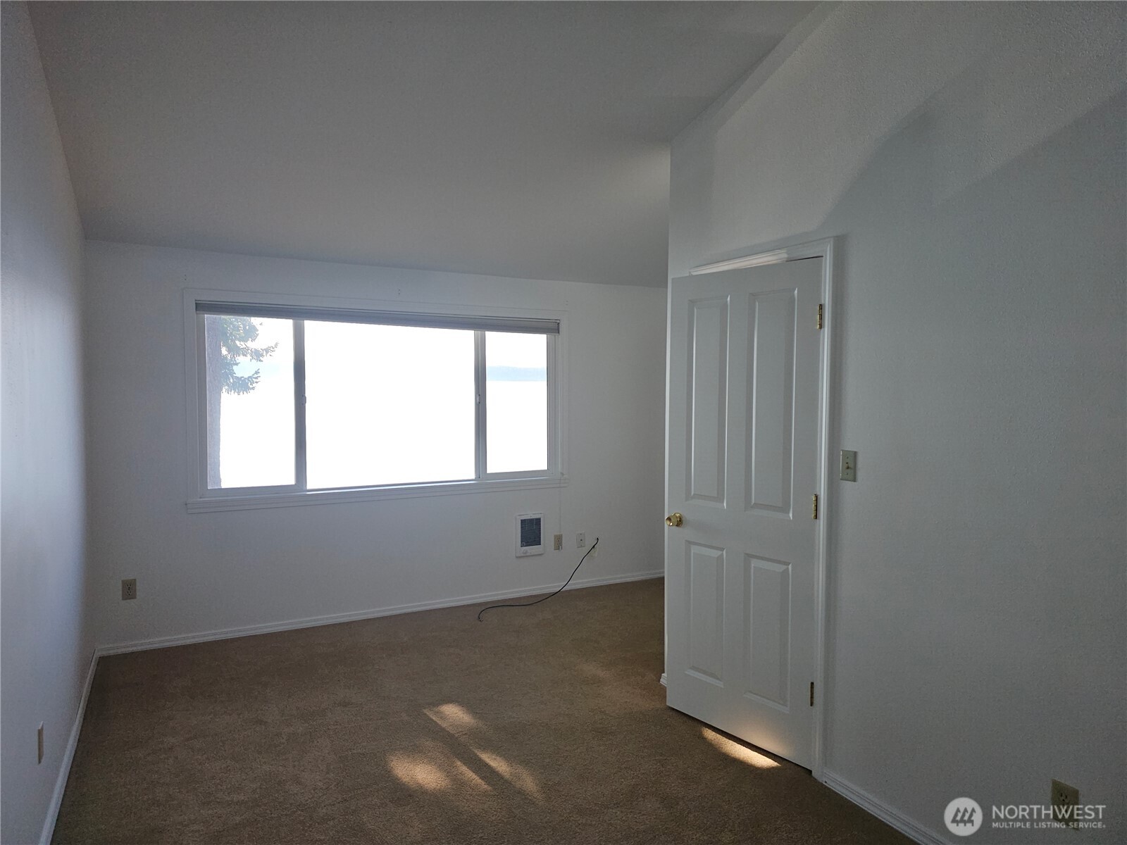 70 East Sund Road Grapeview, WA 98546 - Photo 25 of 36 an empty room with windows