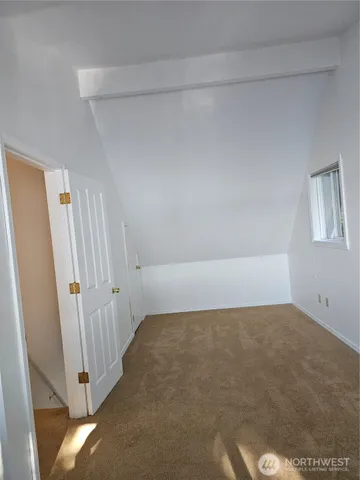 a view of a bathroom with shower