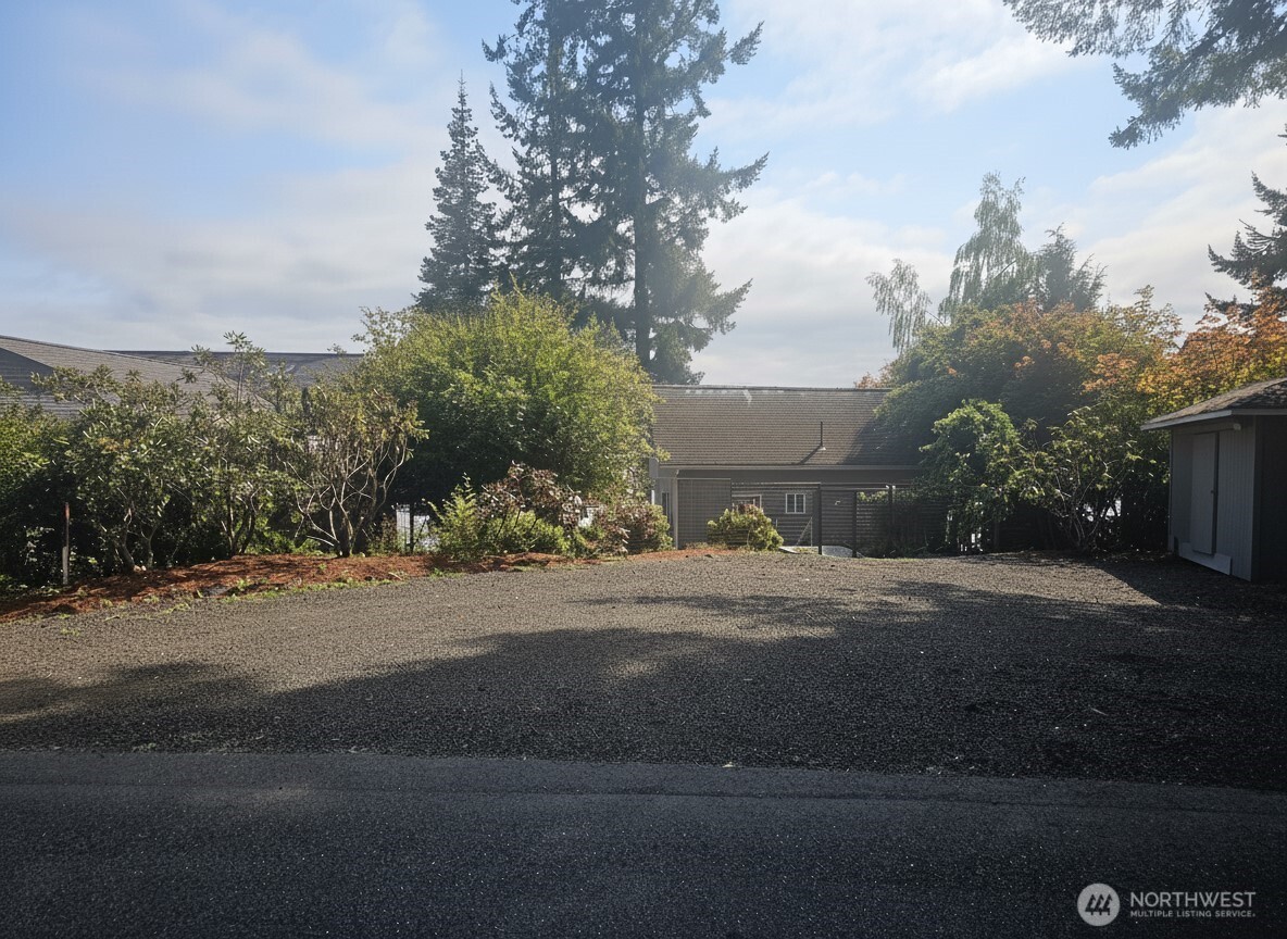 70 East Sund Road Grapeview, WA 98546 - Photo 4 of 36 a view of street and trees