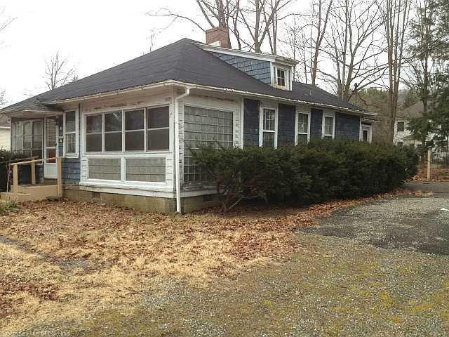 8 Bluff Road Kent, CT 06757 - Photo 1 of 1 a house with trees in the background