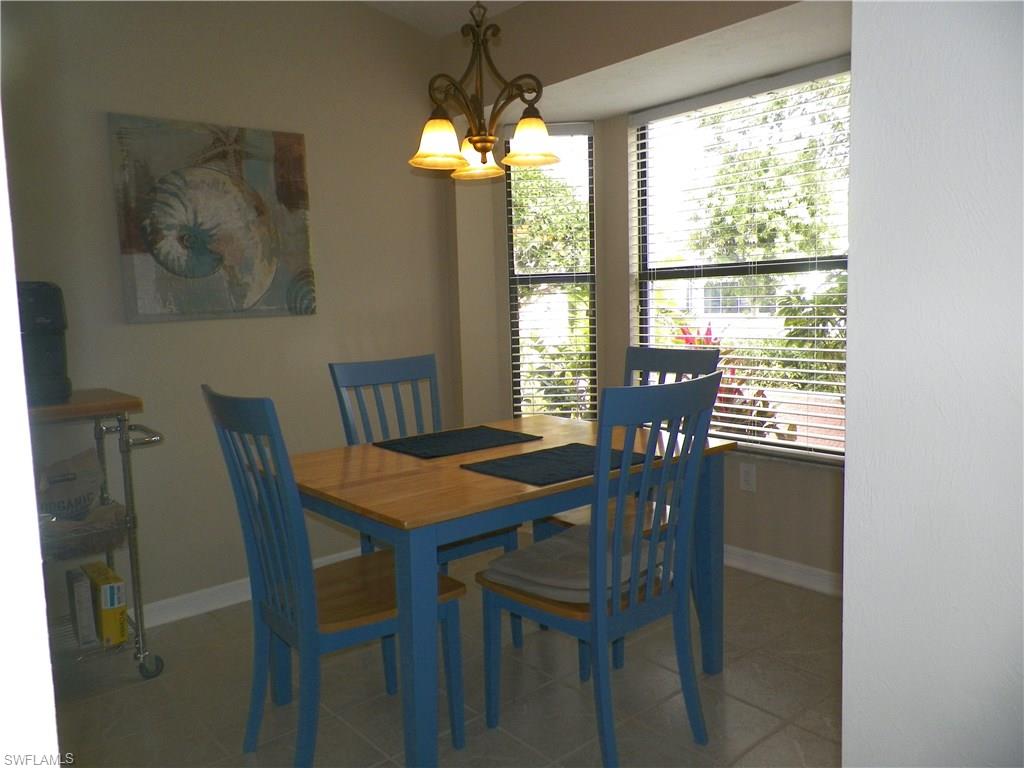 13250 Heather Ridge Loop Fort Myers, FL 33966 - Photo 15 of 35 Kitchen Dining With a View